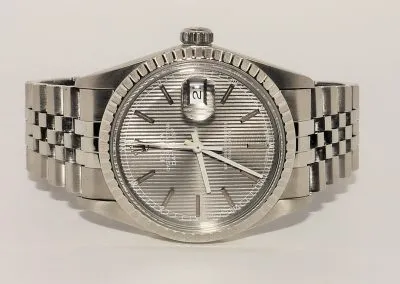 11603689