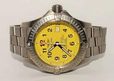 11603700